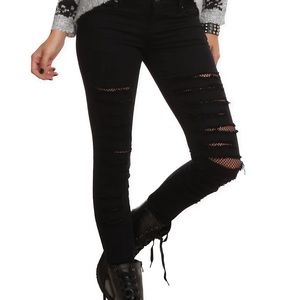 Hot Topic Royal Bones skinny fishnet jeans